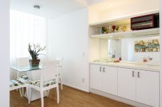 Dining room with table for meals.